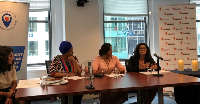 Photo of participants in a panel marking fourth anniversary of the ISIS attack on the Yazidi* community in Sinjar, UN Women Executive Director Phumzile Mlambo Ngcuka, UN Special Representative of the Secretary-General on Sexual Violence in Conflict Pramila Patten and Free Yezidi Foundation Executive Director Pari Ibrahim. Photo: Adina Wolf/UN Trust Fund 