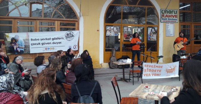 Graduates of the Father Support Programme perform songs about women's empowerment during the 16 Days of Activism. Photo: Mehmet Osman Cetiner/ACEV