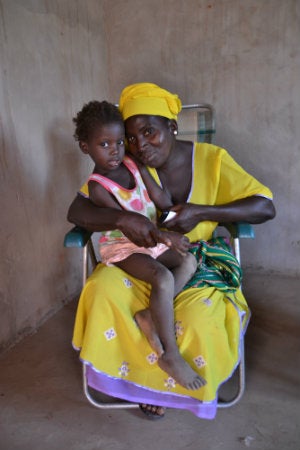 Ndyandin Dawara, trained by GAMCOTRAP, who is a survivor of FGM, shares that she will not subjugate her daughter to FGM. A decision that is supported by her husband who is a community facilitator for GAMCOTRAP. Photo: UN Trust Fund Monitoring and Evaluation Specialist/Gemma Wood 