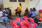 IDEH workers provide hygiene kits to women with disabilities during a COVID-19 information session. Photo: IDEH